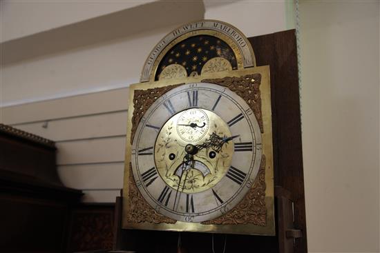 George Hewett of Marlborough. A George III oak eight day longcase clock, H.7ft 9in.